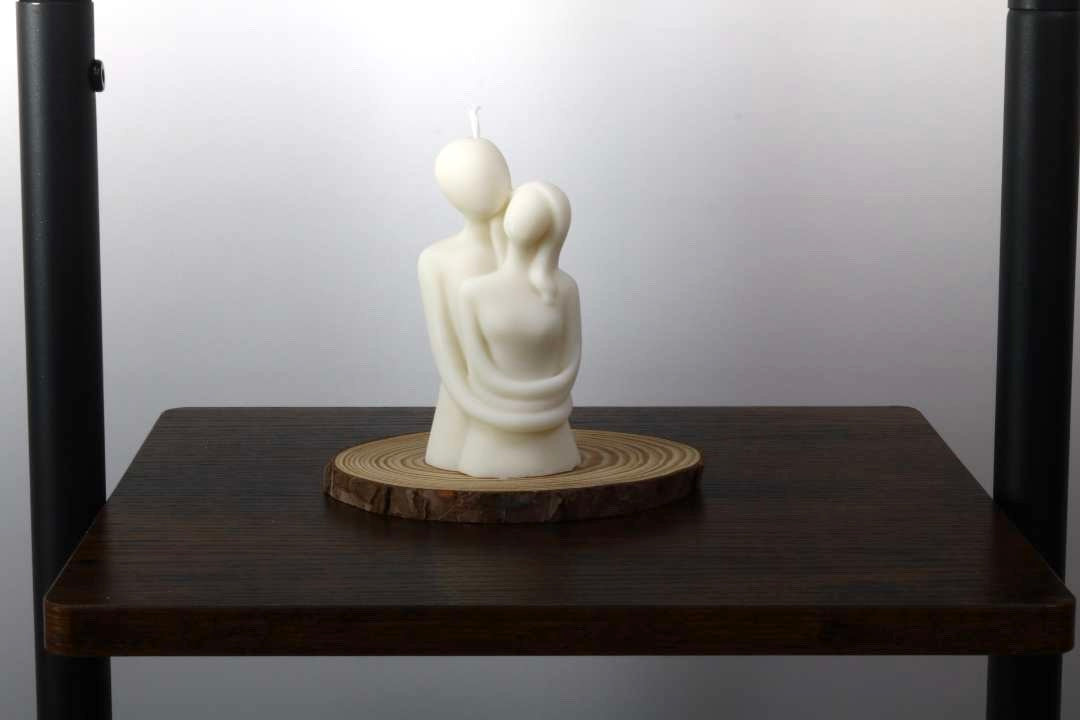 Couple Hugging Candle