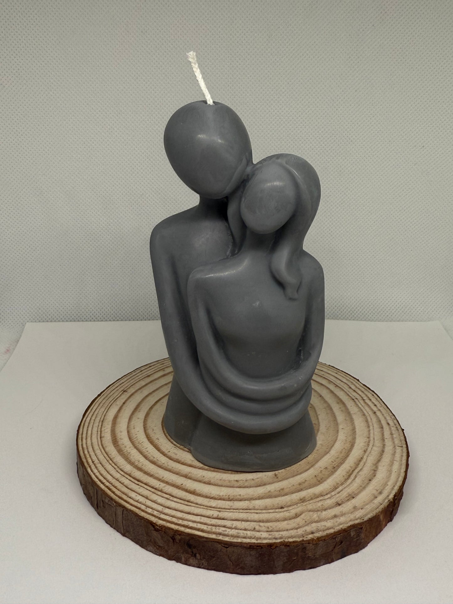 Couple Hugging Candle